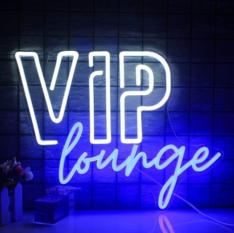 Neon sign reading "VIP lounge" with a blue glow on a dark background.
